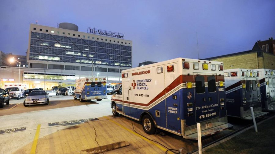 An ambulance is pictured outside the Medical Center, Navicent Health, (then The Medical Center of Central Georgia) in this 2009 file photo. Federal law requires all Medicare-participating hospitals with emergency departments to medically screen and stabilize any patient in need of emergency care.