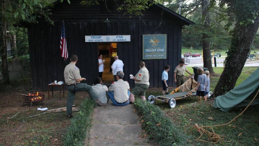 Robbie Thomas (far left) and a group of Eagle Scouts at a troop meeting in front of the Troop 5 Hut on September 18.