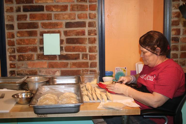 Rikki Waite, the owner, says her mother, Sharon Crookshanks, is always at the restaurant folding her mother’s recipes into delicious empanadas.