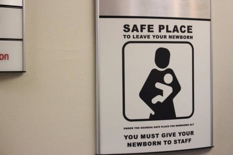In the Peyton Anderson Education Center at Navicent Health in Macon, Ga., mandatory signs designate the site as a safe place to leave newborns under the Georgia Safe Place for Newborns Act.