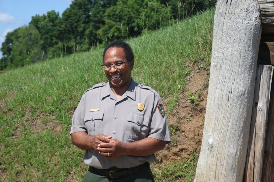 Davis stands outside one of the historical mounds. 