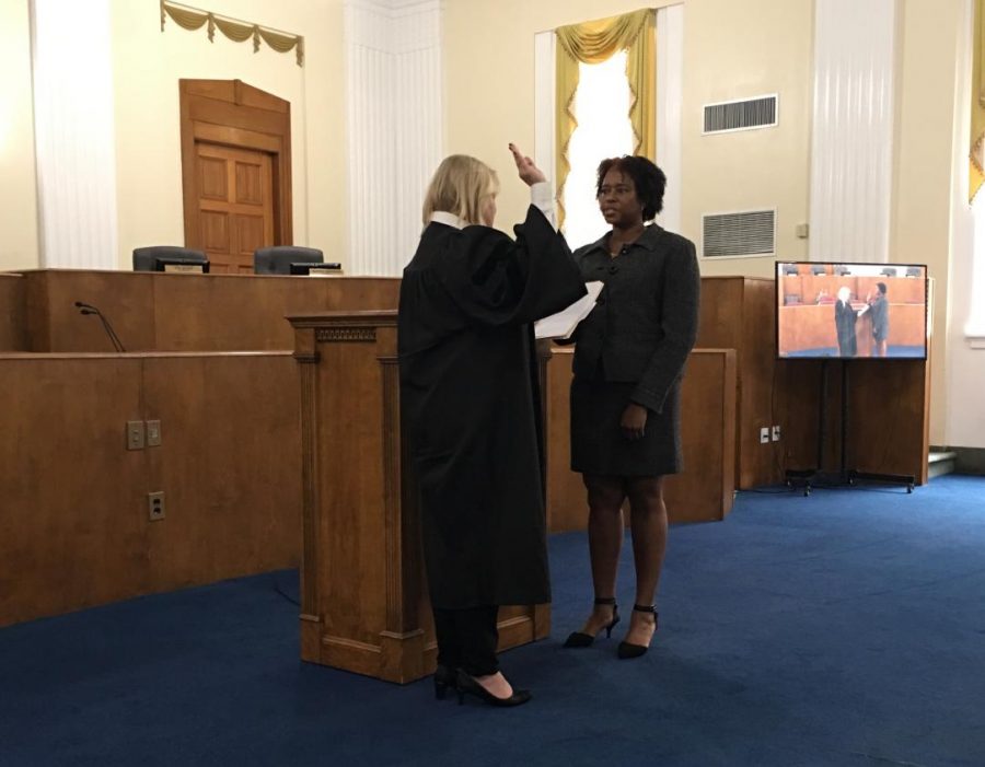 Municipal Court Judge Crystal Jones takes the oath of office Thursday at Macon-Bibb County Government Center.
