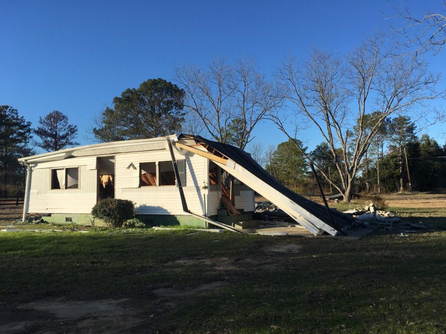 A south Bibb County home sits dismantled at the corner of Kearnes and McArrell drives where Georgia Power will begin building a 650 acre solar farm in 2020. 