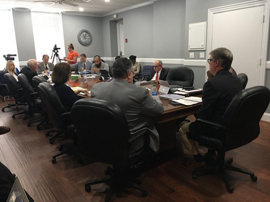 CPA Miller Edwards, right, briefs Macon-Bibb County leaders on the Fiscal 2019 audit that saw a $13.5 million dollar surplus. 