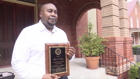 ichael Gray, the great, great, great nephew of Lucy Craft Laney, at Washington Avenue Presbyterian Church on Tuesday with a Hall of Fame plaque from Lucy Craft Laney High School in Augusta, Georgia, that was presented to the family in 2016. 