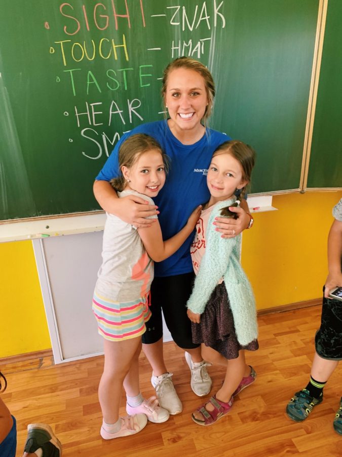 Elizabeth O’Dell with some of her third grade students on a Mercer on Mission trip to Slovakia in 2019.