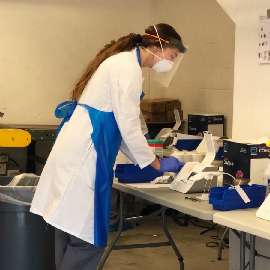 Savannah Cunningham in the lab where she is spending part of her internship running tests for Covid-19.