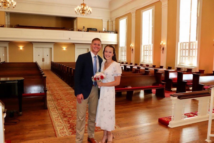Alex and Caroline Davis stand in the empty Vineville Academy Methodist Church were they had their private ceremony. (Photo courtesy Caroline Davis.)