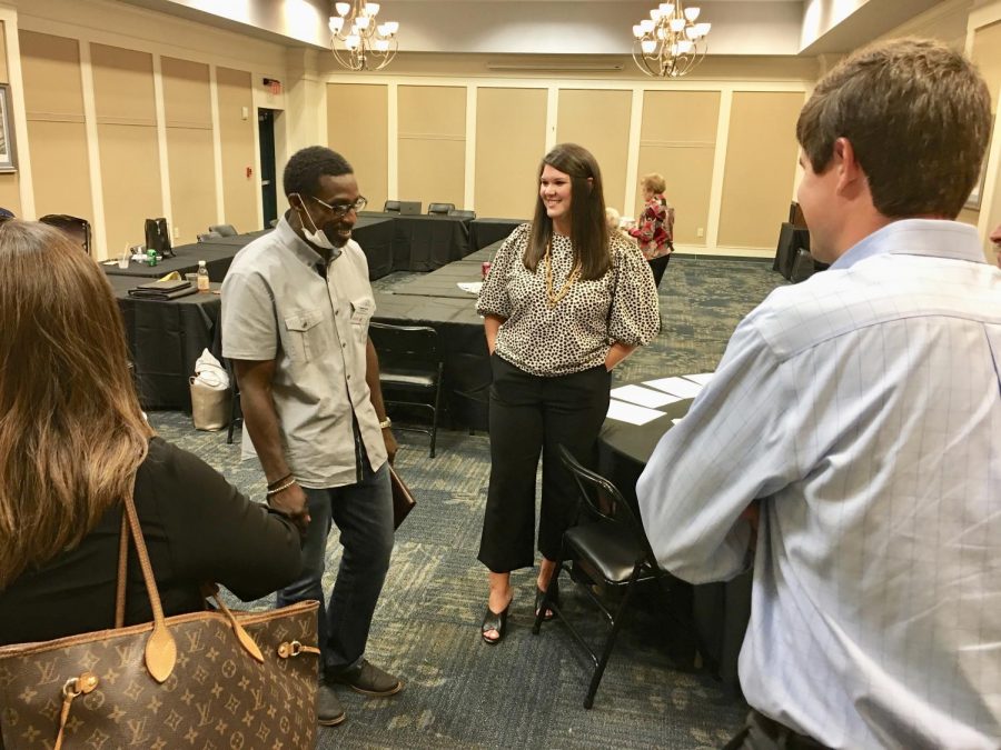 Caroline Childs, center, executive director of Keep Macon-Bibb Beautiful, chats with board members after her first meeting in September of 2020.