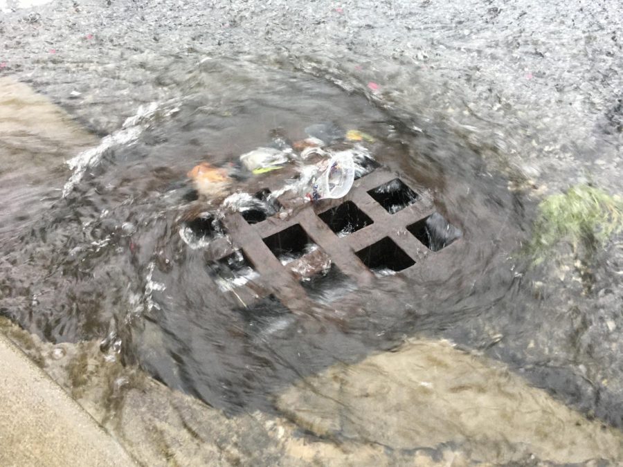 A whirlpool of stormwater catches trash in a drain during a summer thunderstorm in 2020. Beginning in 2022, stormwater management fees were levied in Macon-Bibb County for residents, businesses, industries and churches.