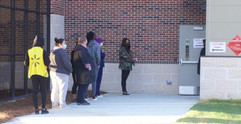Voters waiting in early morning line at Macons Appling Middle School precinct on Nov 3.