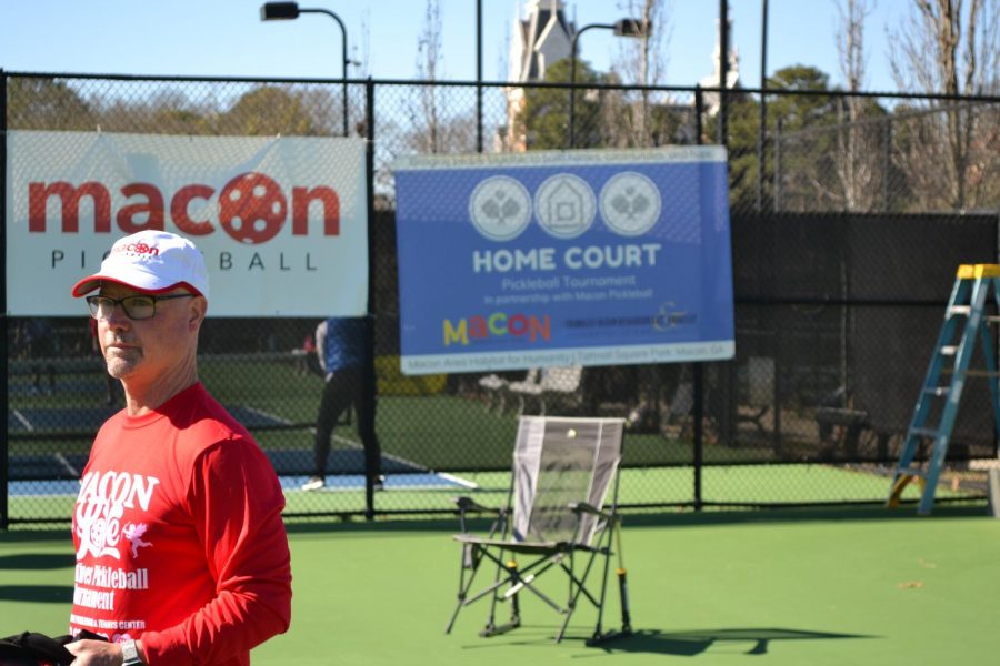 Paul Midkiff, president of Macon Pickleball, stands, surveying the first match of “Macon Love.” “This is really the first tournament we’ve run out here,” Midkiff said. “Last tournament, Habitat’s, we had 140, this one was 100, and we have, in April, the Cherry Blossom tournament, right now we have almost 200 people signed up for it, we hope to get that to 250.” Photo by Henry Keating
