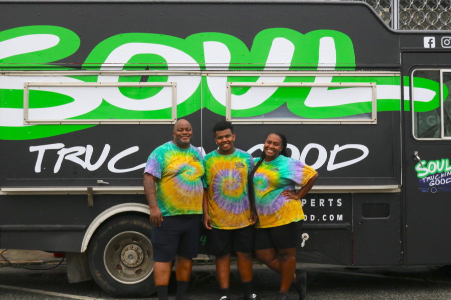 (From left to right) Carl Johnson, son Kyler and Carls wife, Jei, operated Soul Truckin Good during the 2021 Cherry Blossom Festival.