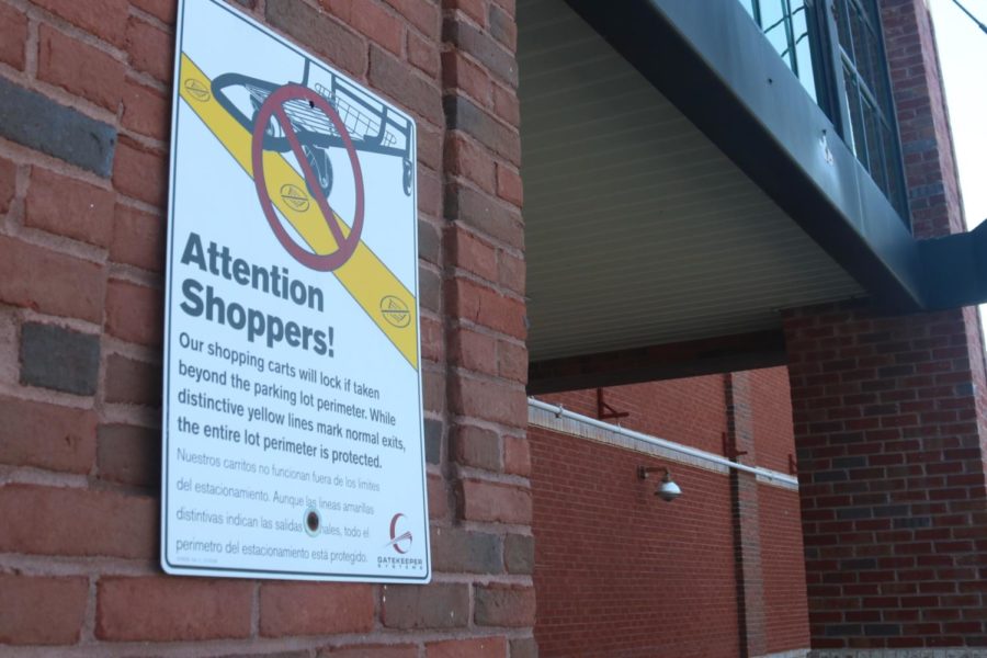 Remnants like a sign reminding shoppers to return their shopping cards remain on the premises of the Pio Nono Kroger, serving as a reminder to when the building was a busy supermarket. 