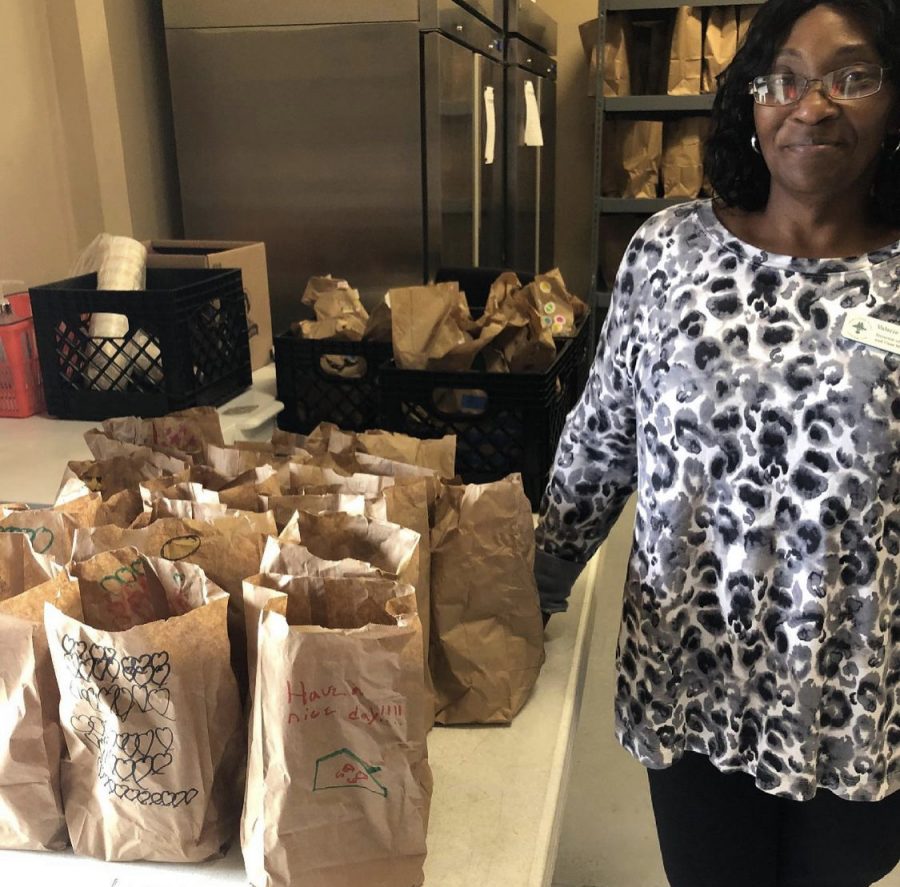 Valerie Sewell, the director of operations at Loaves and Fishes Ministry, getting ready to serve a lunch that was provided by a children’s group, according to Jake Ferro.