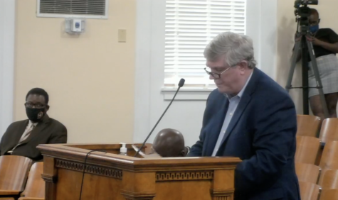 Pawn Shop owner Howard Reed urges Macon-Bibb Commissioners to vote against 90-day moratorium on licensing new shops. 