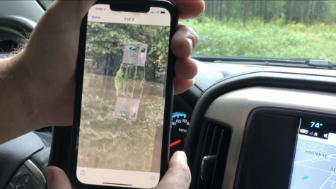 Macon-Bibb County Commissioner Bill Howell shows a south Bibb County deer stand partially submerged after heavy rain in October of 2021. 