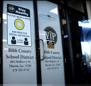 What happens when a Bibb County Schools student tests positive for Covid?