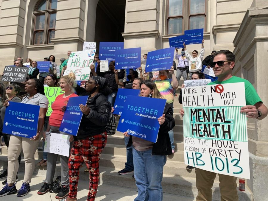 A group of advocates who support the House’s sweeping mental health bill rallied outside the state Capitol Monday after opponents swarmed a series of hearings last week.