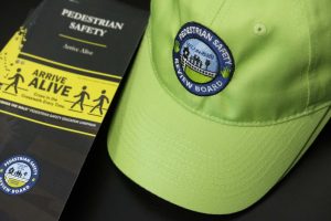 Macon-Bibb County Pedestrian Safety Review Board pamphlet and hat.