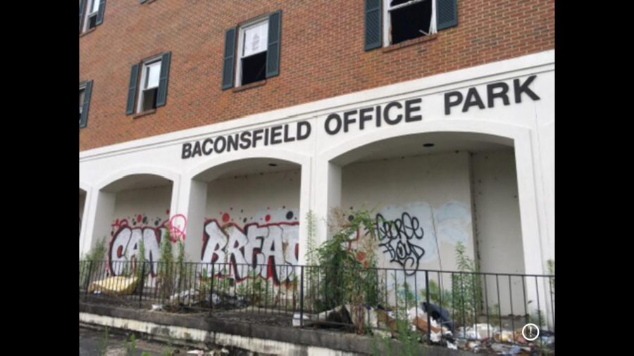 The vandalized and partially burned Baconsfield Office Park buildings, shown here in 2020, are being renovated into apartments. 