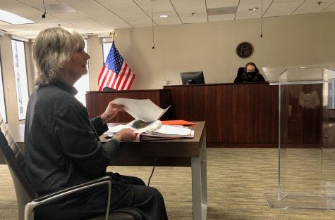Macons Diane Vann listens to an assistant attorney general challenging her State Senate District  18 candidacy during an Administrative Law Judge hearing May 19.