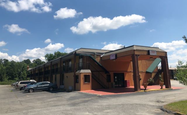 Motel owner Ashok Patel asked to reverse his earlier rezoning change to allow him to refinance this motel at 4173 Cavalier Drive. 