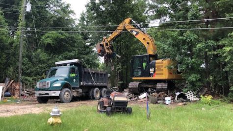 Macon-Bibb County public works crews removed tons of debris from homes along McKinley Drive in July under the new nuisance properties ordinance passed in May.