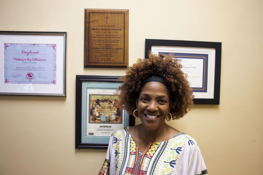 Adrienne Lewis poses briefly for a photo after her interview on April 20, 2023. Adrienne is the case manager for the Daybreak Center and has worked with many people over the years, she believes the biggest hurdle for many who become homeless is the cost of housing itself.