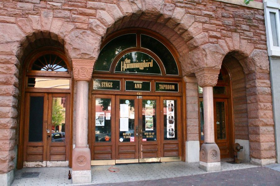The brick and wood exterior of The Hummingbird Stage and Taproom in Macon, Georgia.