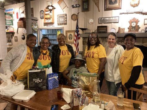 On March 3, Genesis Joy House founder and CEO Margaret Flowers, third from right, joins volunteers and staff at the Warner Robins Cracker Barrel for a birthday celebration. The nonprofit aims to end chronic homelessness among women veterans. 