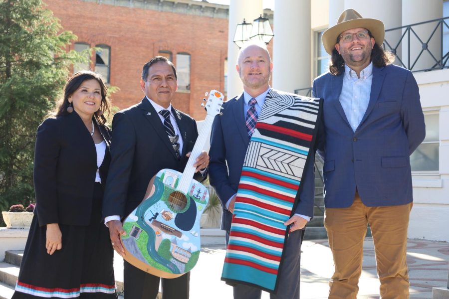 (From left to right) Tracie Revis, David Hill, Lester Miller, and Seth Clark stand for media photos after the ceremonial flag raising of the Muscogee Creek Nation Flag at Macon City Hall on January 20, 2023.  (Photo by Jaycie Calvert)