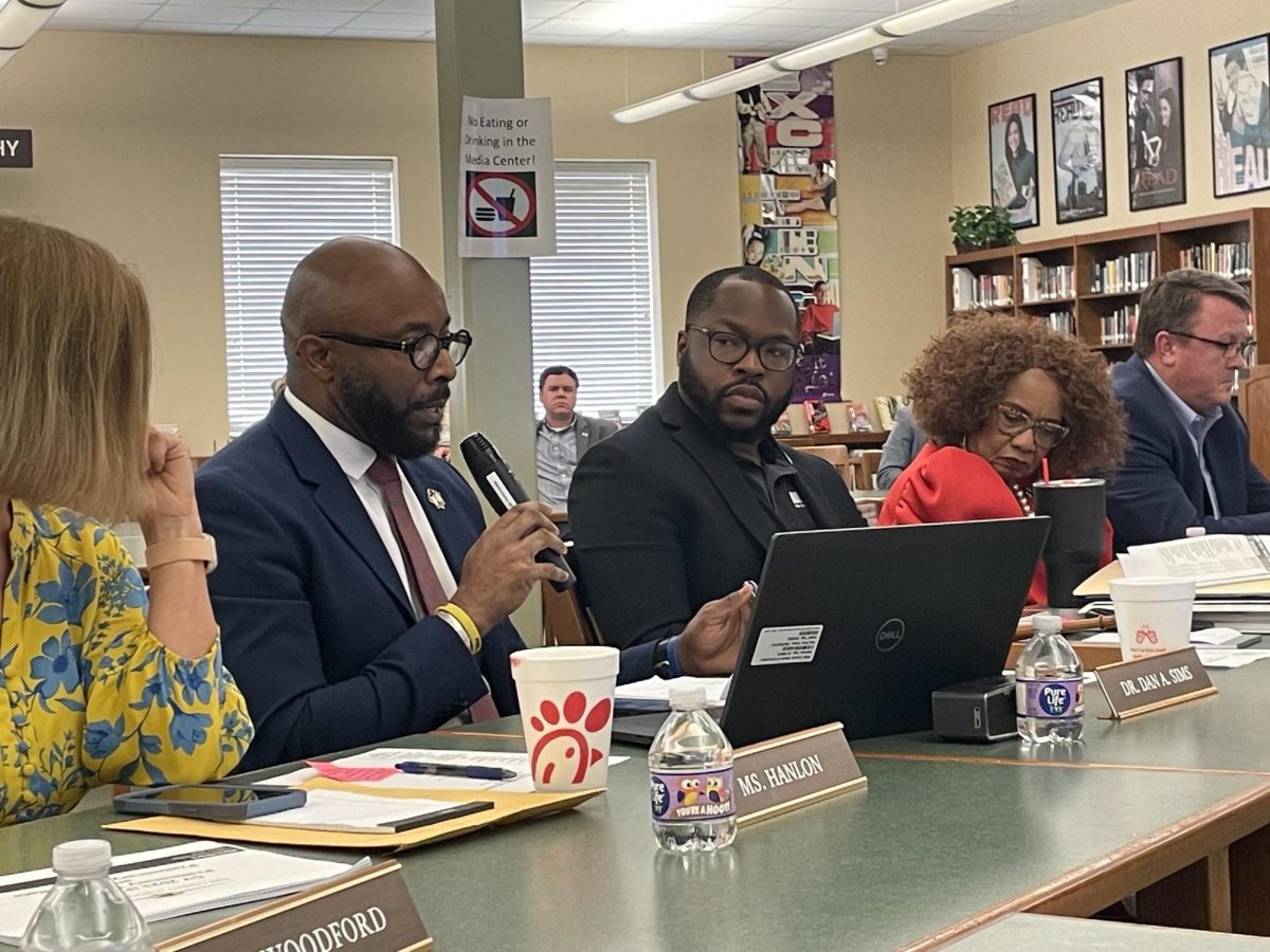 Bibb County Schools Superintendent Dan Sims, second from left, made no specific recommendations to the board regarding the millage rate.  