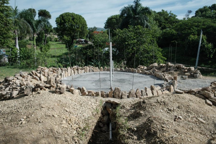 Concrete for the foundation of the stone tank has been poured and will cure for a day before construction of the walls begins. Students with Mercer On Mission helped construct this tank in the Sabana Bonita community of El Cercado, Dominican Republic from May 31-June 17, 2023.