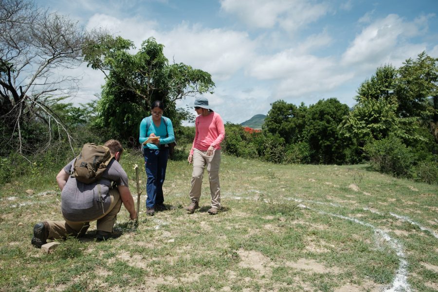 Mercer University engineering student Michael Nierodzik (left), Samatha Vaquero and Dr. Natalia Cardelino mark the outline for what will be the start of a new stone water tank in the Sabana Bonita community of El Cercado, Dominican Republic. Mercer worked in the community from May 31 to June 17, 2023.