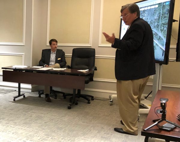 Attorney Bill Larsen tells the Macon-Bibb County Planning & Zoning Commission that his client wont be able to do anything with less than half-acre along the railroad tracks on Forsyth Road as long as its zoned residential.