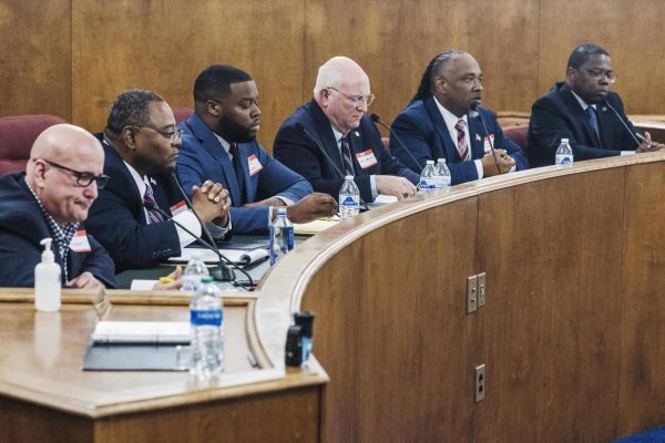 Candidates for Bibb County sheriff, from left, Chris Patterson, Ron Rodgers, DeAndre Hall, Sheriff David Davis, Marshall Hughes and Chris Paul sit for a March 2024 forum during their runs for the office.