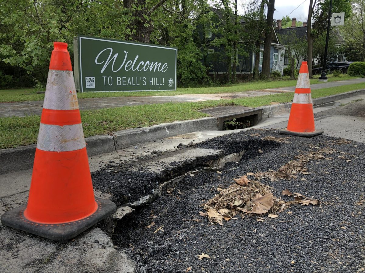 A+sinkhole+on+Calhoun+Street+originally+was+reported+through+Macon-Bibb+Countys+See%2C+Click%2C+Fix+website%2C+but+should+have+been+reported+by+calling+the+Macon+Water+Authority+for+swifter+reaction.+