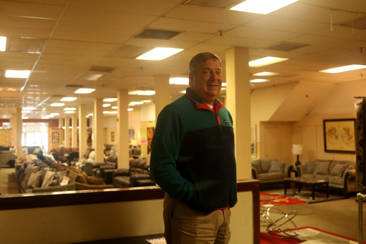 Portrait of Union Furniture store owner Simon Becker on the sales floor on Monday, April 22, 2024. Becker is in his finals days as owner of the store as it is now closing.