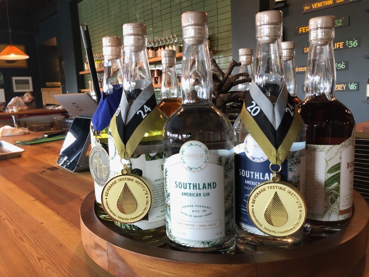 Longleaf Distilling Co. earned two Double Gold medals for its Alba Liqueur and Navy Strength Southland Gin at the 2024 San Francisco World Spirits Competition. Longleaf spirits also have been recognized by the Beverage Testing Institute and the Georgia Trustees Wine & Spirits Competition with medals shown here. 