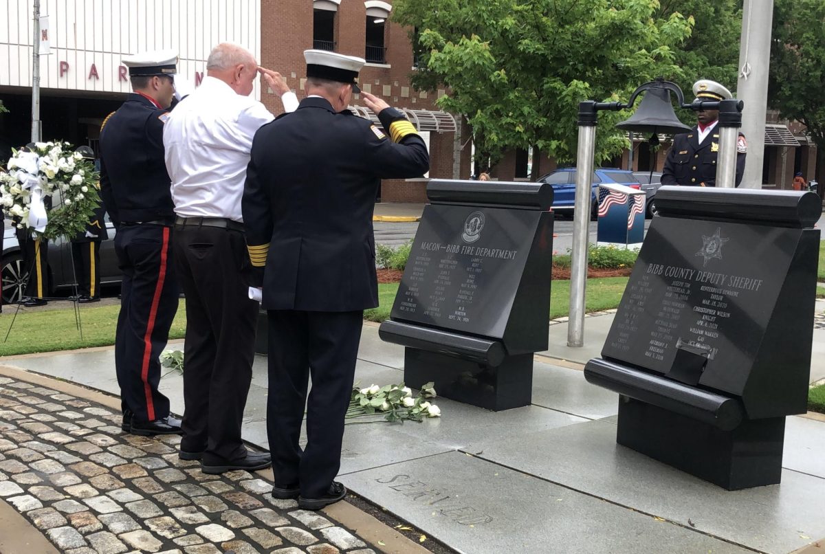 Representatives+of+the+Macon-Bibb+County+Fire+Department+salute+fallen+firefighters%2C+including+W.B.+Norton+who+died+in+1926.+