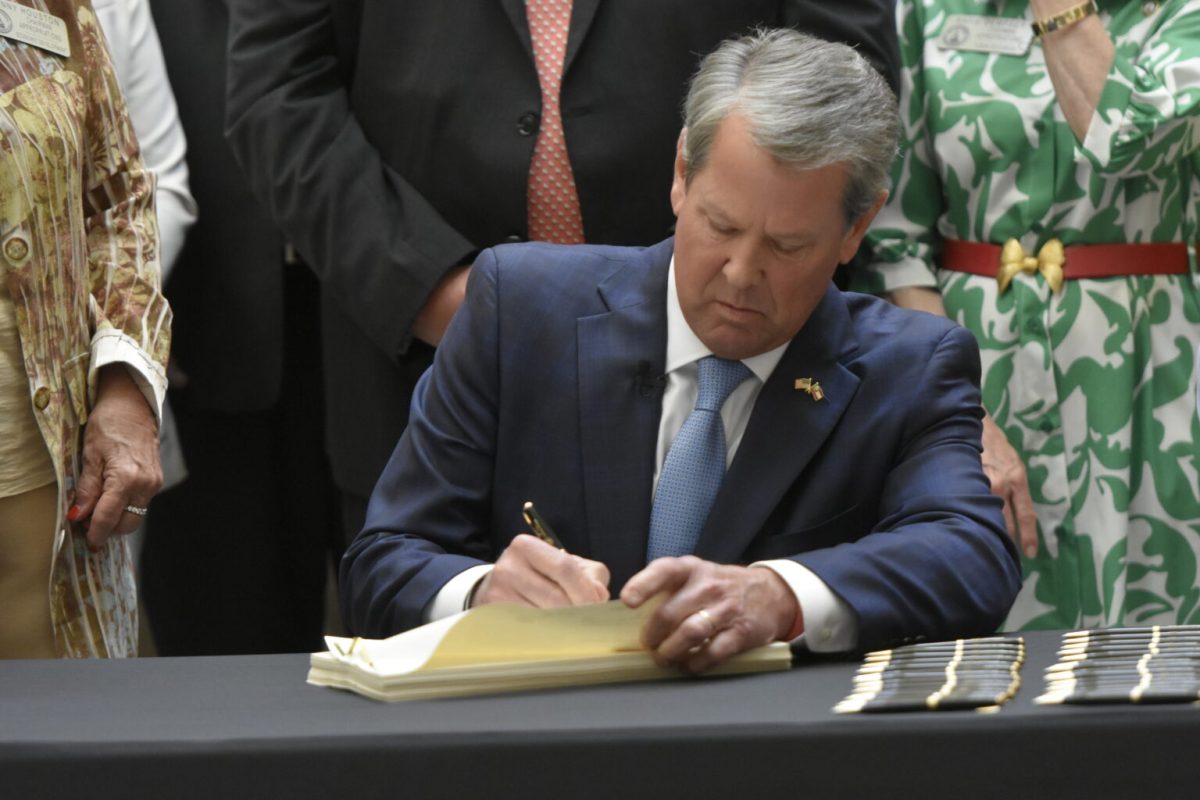 Gov.+Brian+Kemp+signed+off+on+the+2025+budget+at+a+signing+ceremony.+Later+that+day%2C+he+vetoed+a+dozen+bills.