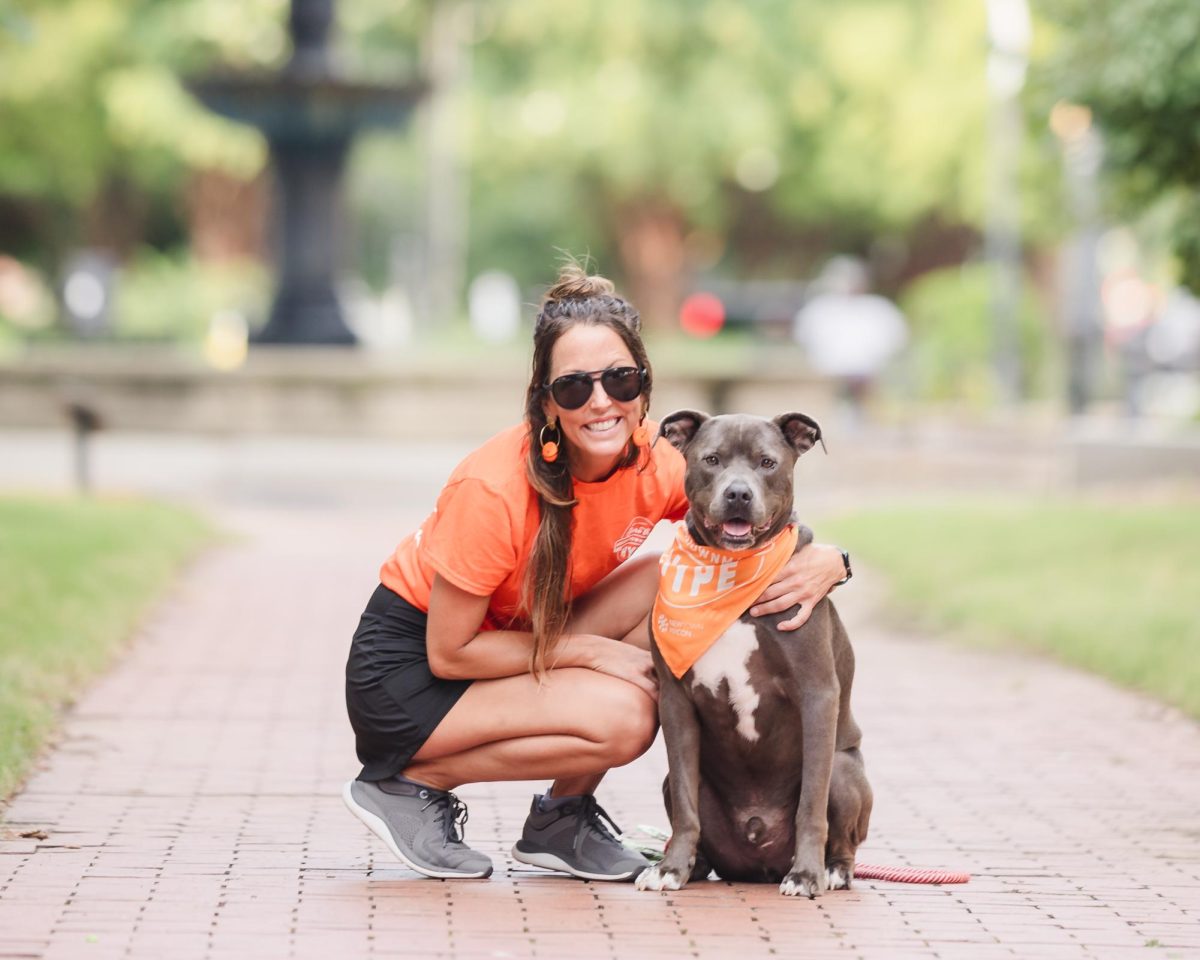 NewTown Macon Hype Team member Elizabeth Jane and Hype Hound Andre welcome patrons to downtown.  