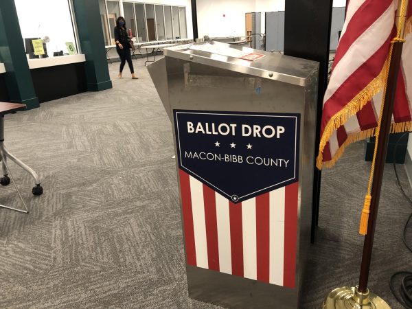 The attorney for the Macon-Bibb County Board of Elections will research Georgia law to see if the absentee ballot drop box can be moved closer to Macon Mall entrances. 