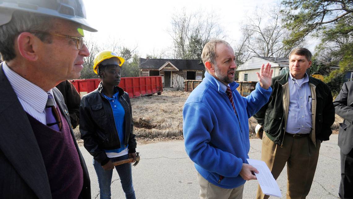 Harold Tessendorf, executive director of Macon Area Habitat for Humanity, talks about the its Blight Out of Sight campaign. The organization has identified 118 homes in Lynmore Estates that they considered blighted. Photo from 2014.