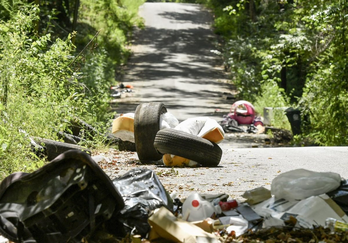 Illegal dumping on Center Street makes the road an obstacle course for drivers.