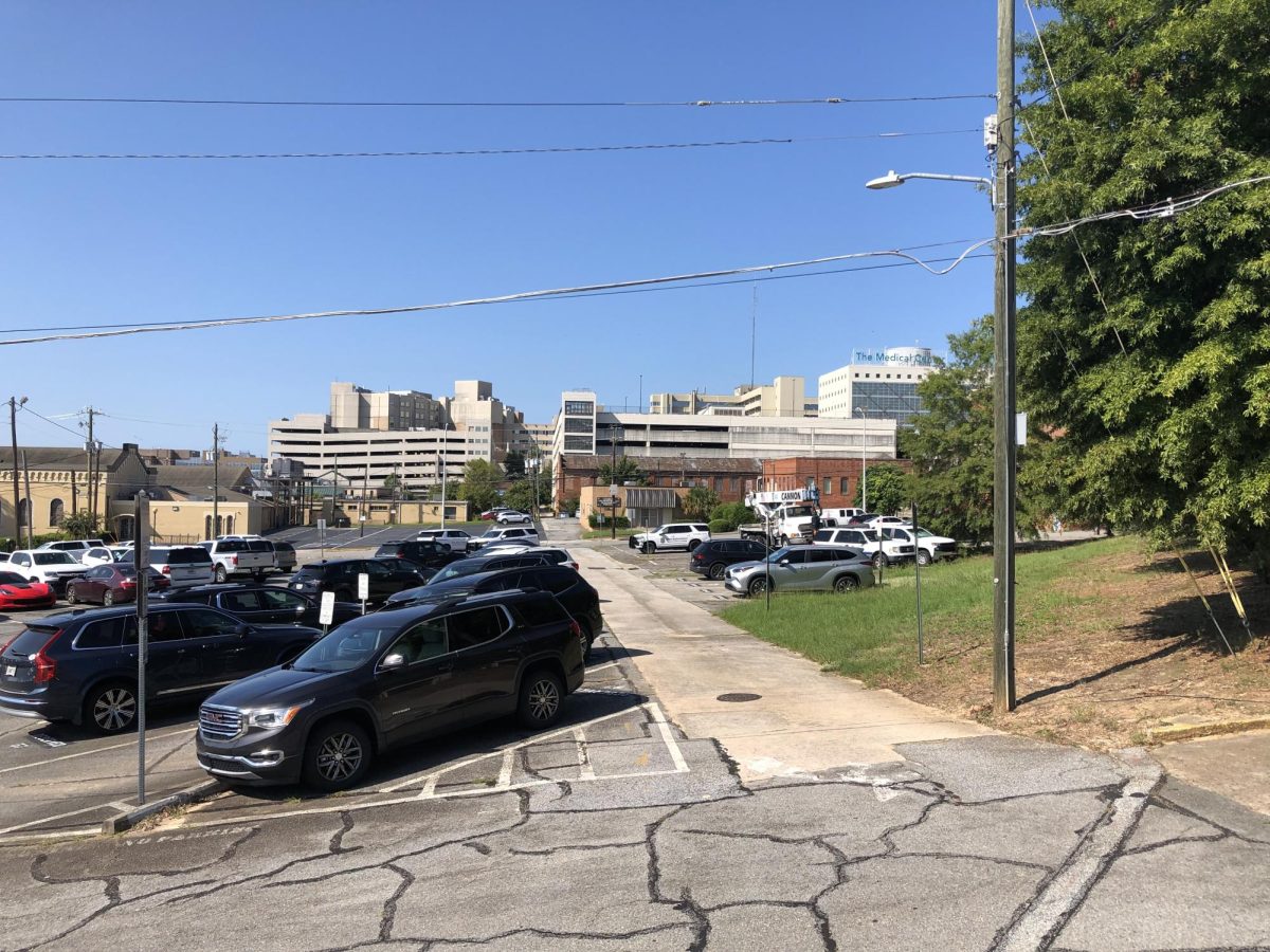 Macon-Bibb County closed this abandoned right-of-way behind City Hall to allow for construction of a parking deck as part of a mixed-use residential and retail development.