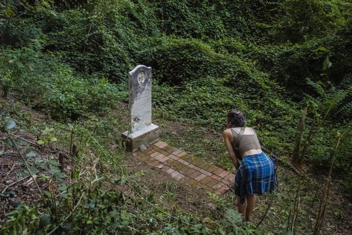 The grave of Blanche Haywood. Until recent work by preservationists in the historically African American Oak Ridge Cemetery, the grave of the woman born in the 1840s was completely hidden by the understory.