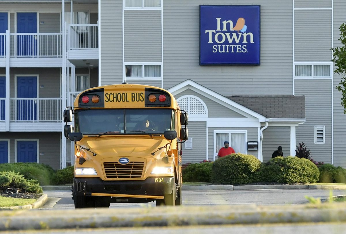 A handful of Bibb County public school students boarded a bus at InTown Suites on Eisenhower Parkway early one dewy morning in August.