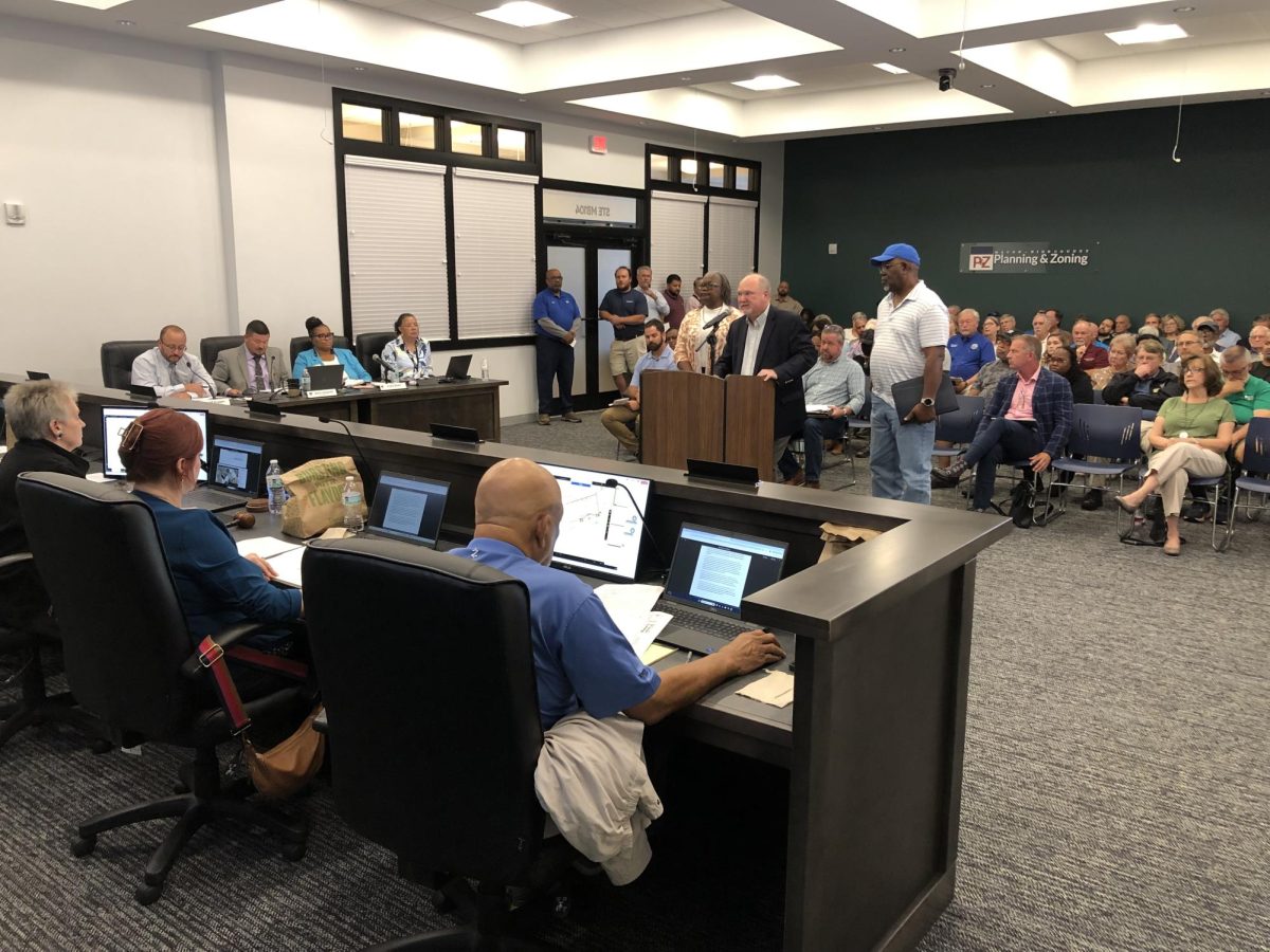 Neighbors packed into the Oct. 14 meeting of the Macon-Bibb County Planning & Zoning Commission in opposition to a south Bibb church and Lizella business park. 